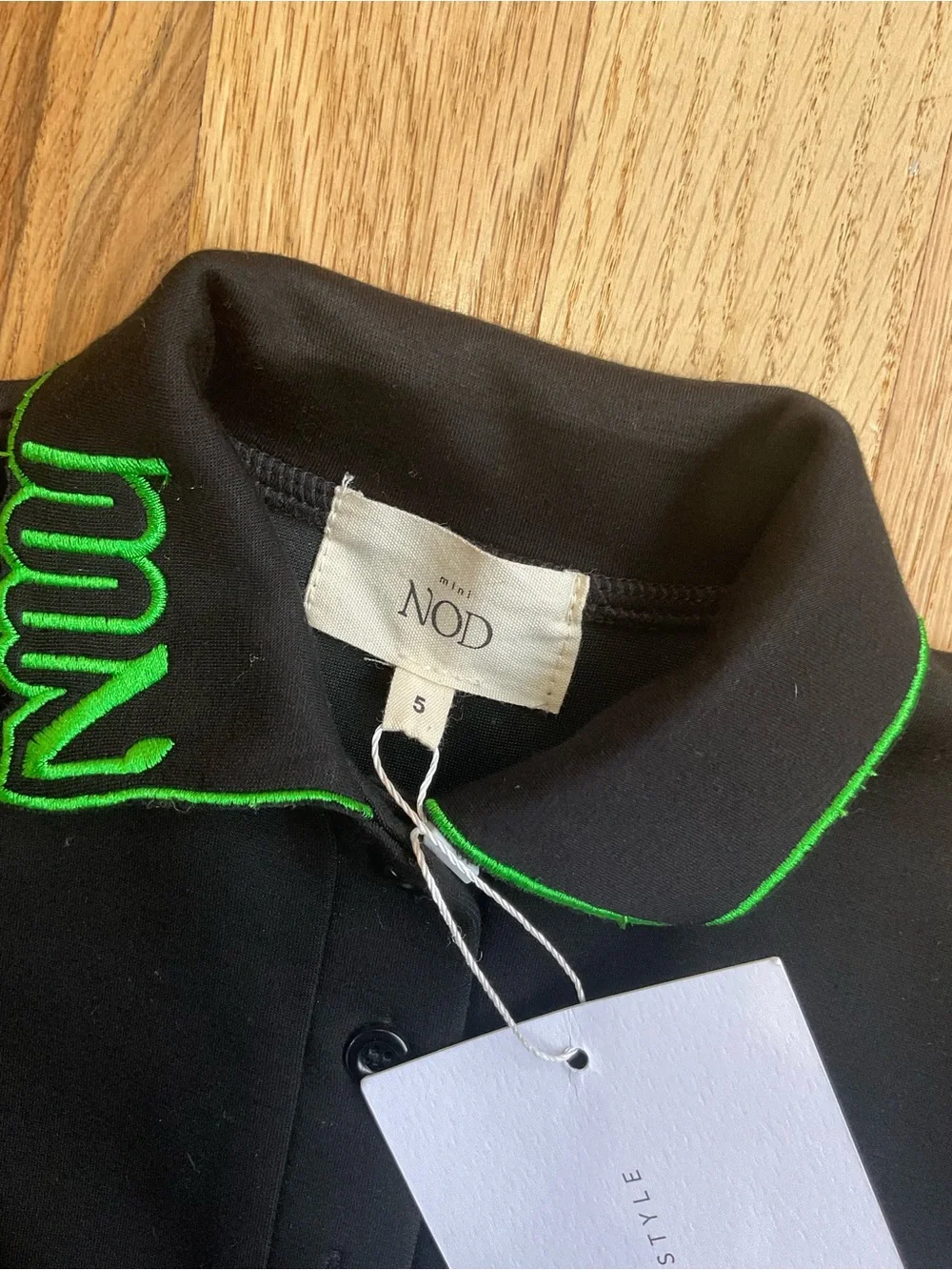 Mini nod Kids Black Polo Top with Green Trim